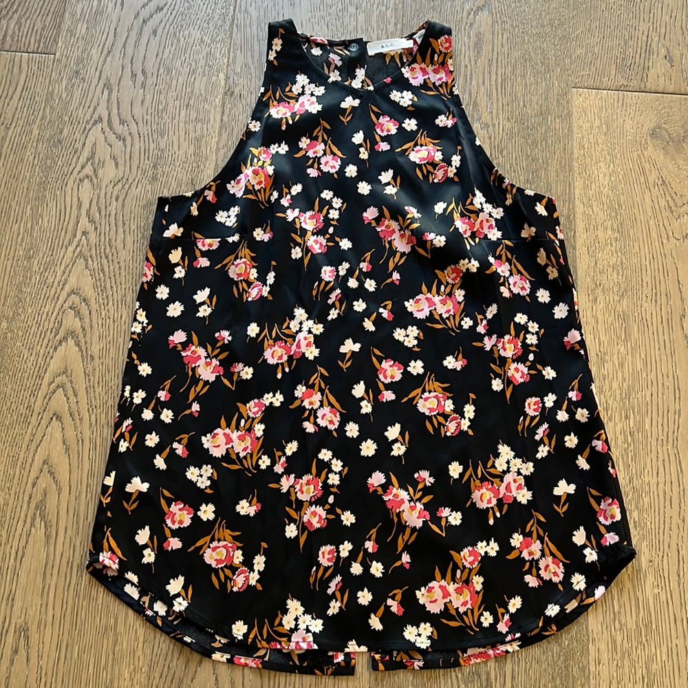 A.L.C Anise black silk blouse with a floral print. Racerback, slit and snap back